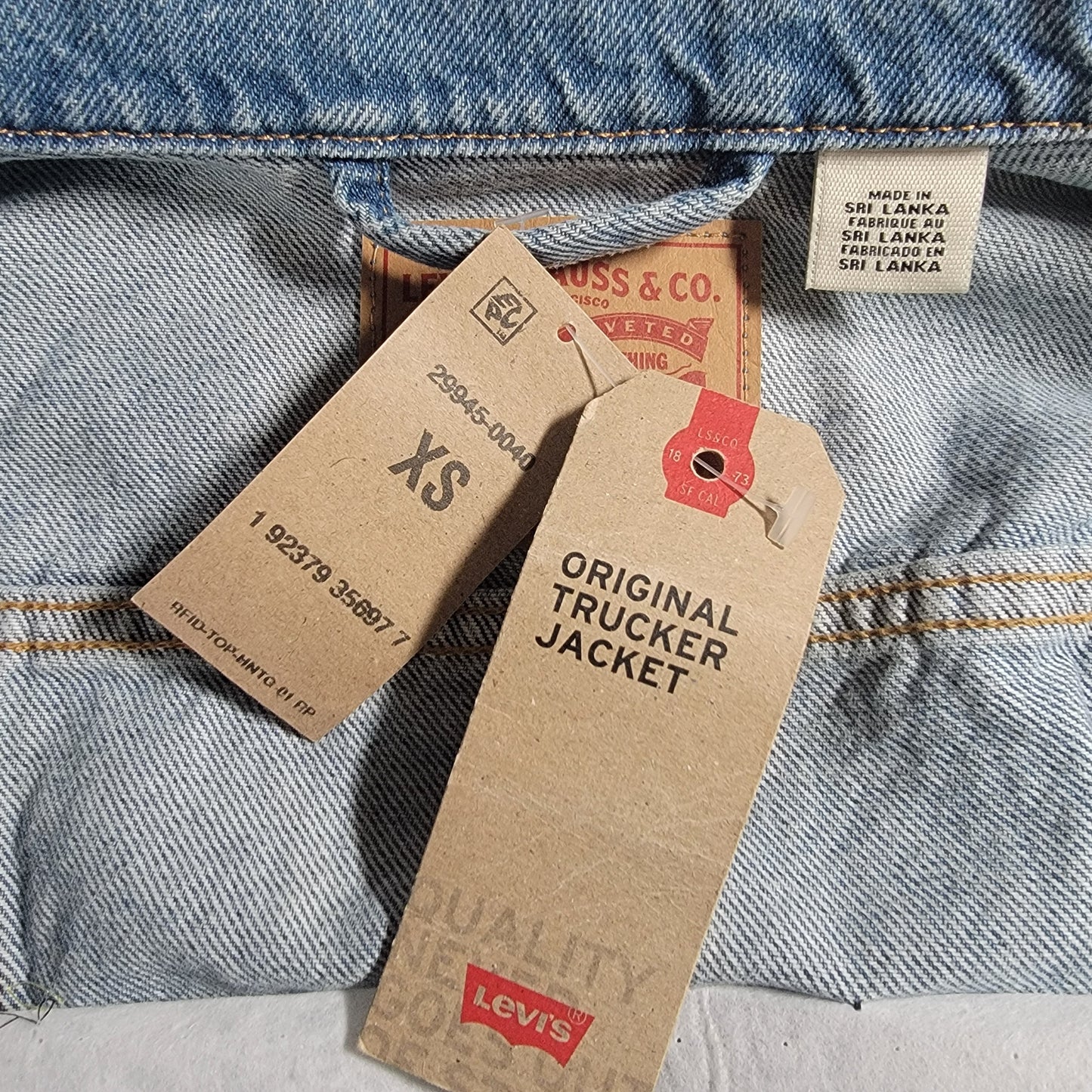 New Levi Strass Jean Jacket with Embroidered Sunflower. XS Levi Blue Jean Jacket with Red Pocket Tag. Denim Trucker Jean Jacket with Tags,