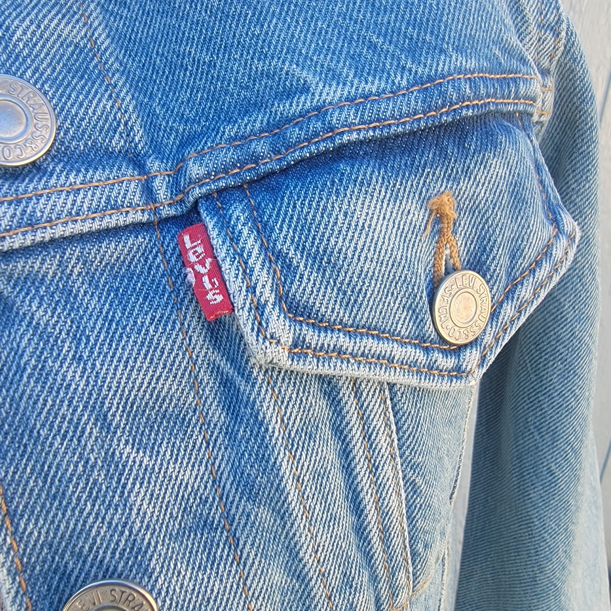 New Levi Strass Jean Jacket with Embroidered Sunflower. XS Levi Blue Jean Jacket with Red Pocket Tag. Denim Trucker Jean Jacket with Tags,