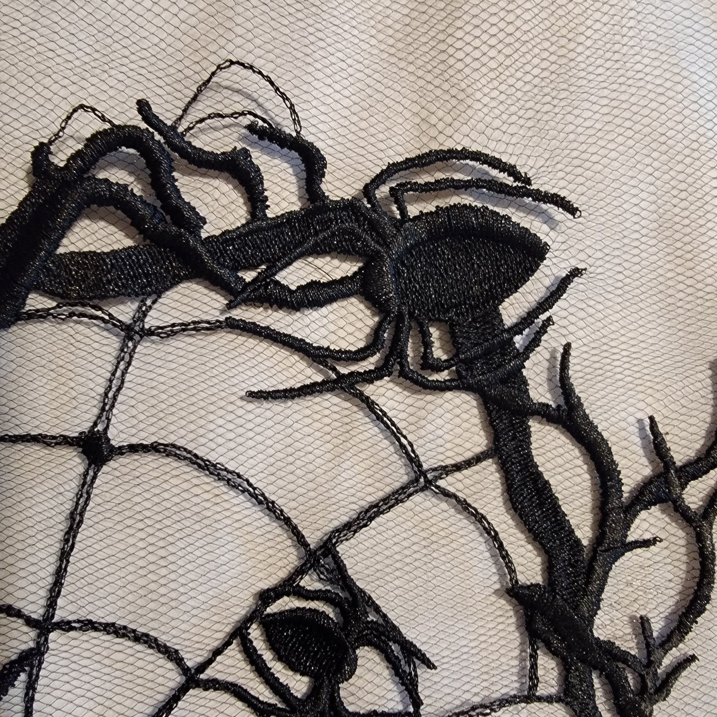 Spider and Spider Web stitched on on Black or White Tulle