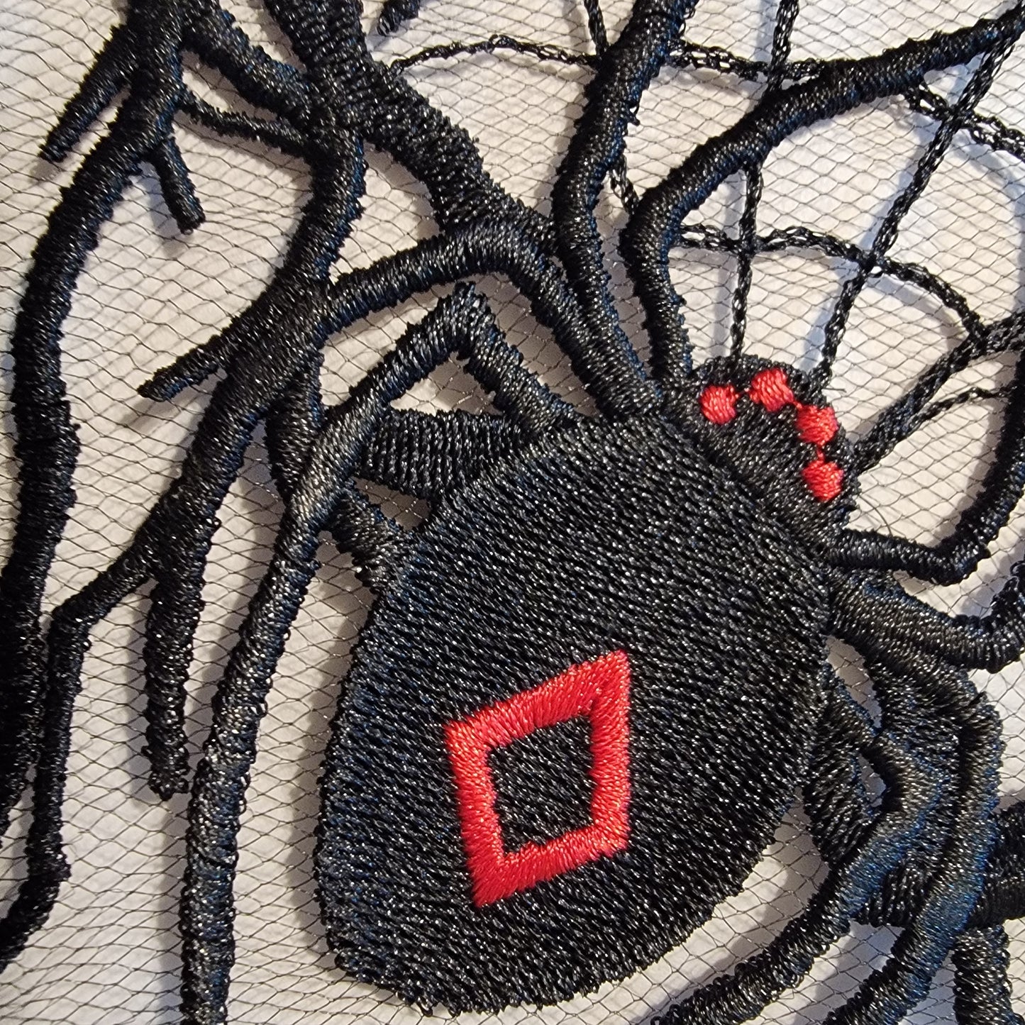 Spider and Spider Web stitched on on Black or White Tulle