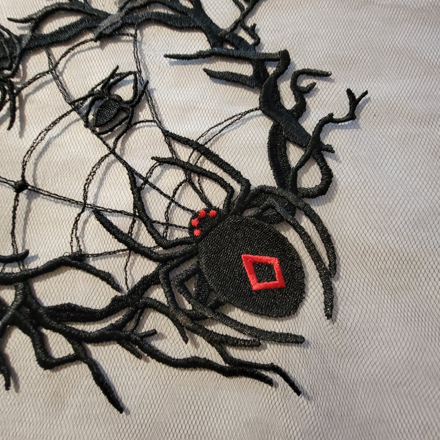 Spider and Spider Web stitched on on Black or White Tulle