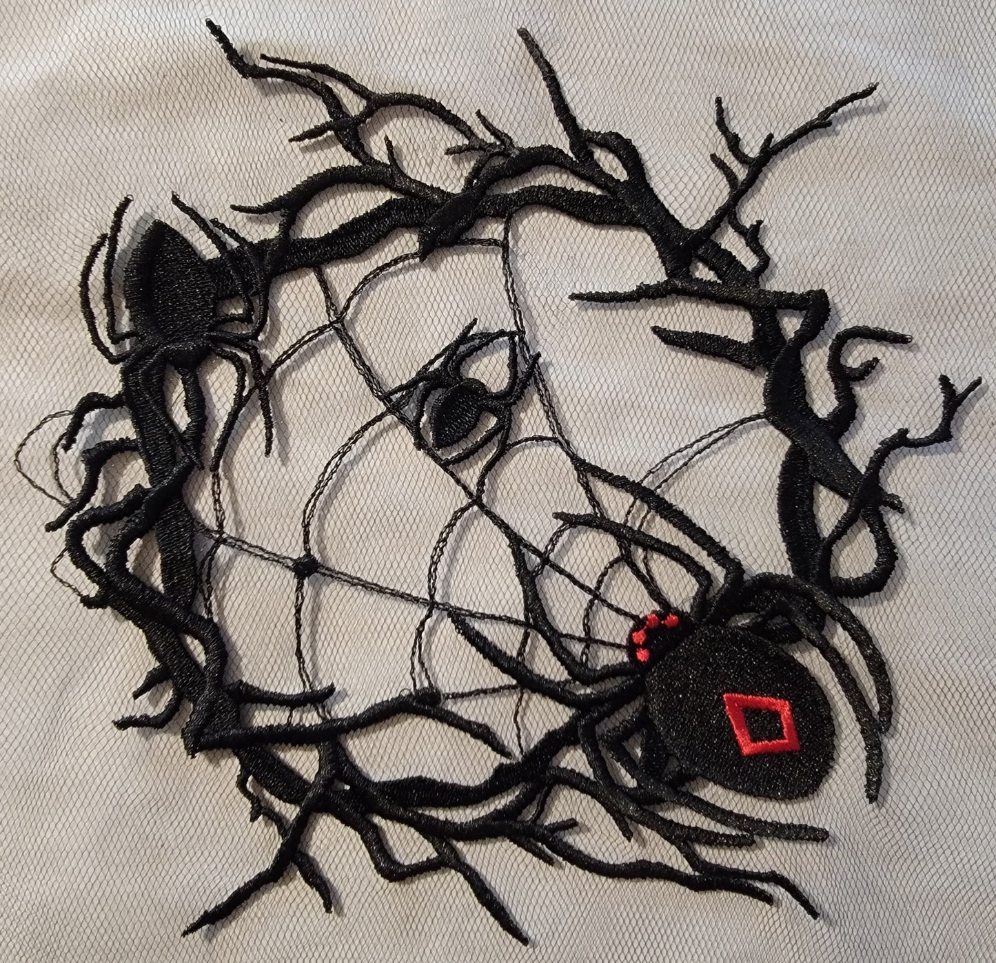 Spider and Spider Web stitched on on Black or White Tulle