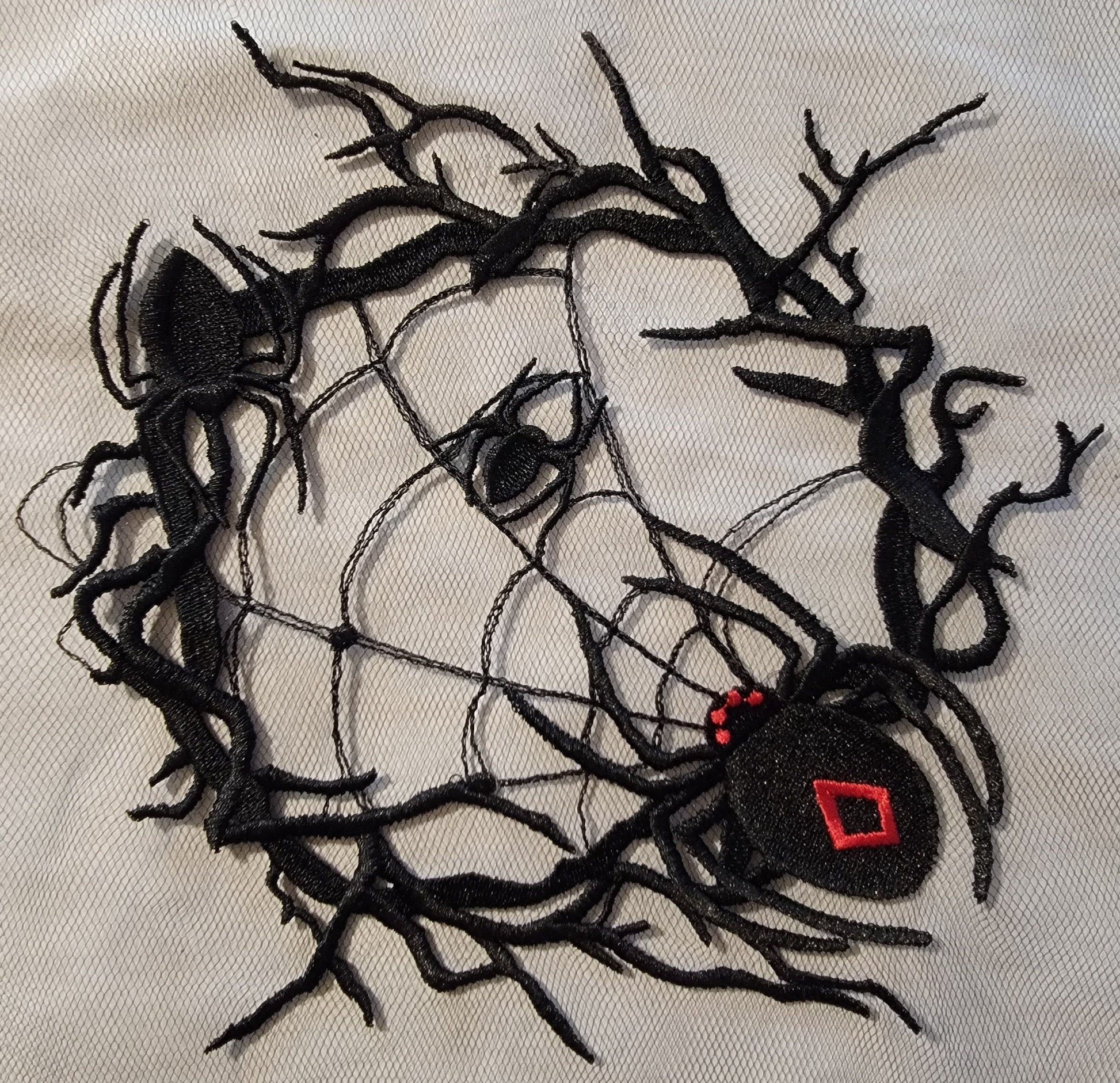 Spider and Spider Web stitched on on Black or White Tulle