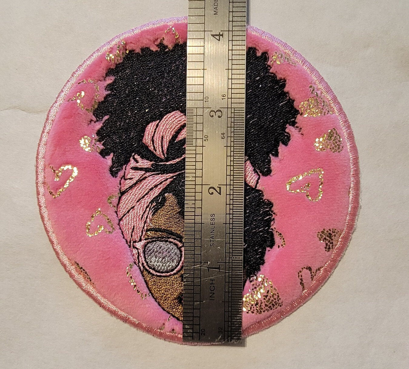 Black Girl Magic with Pink Sunglasses and iron-on placement adhesive on back.