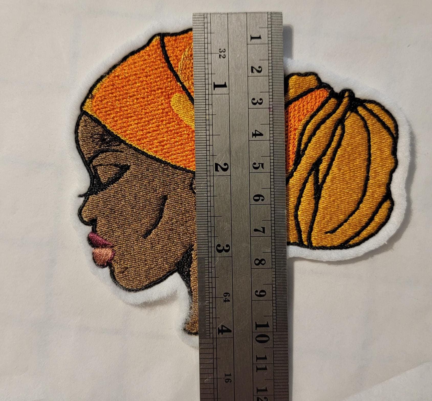 Regal Beauty in Gold Headwrap – Embroidered Patch
