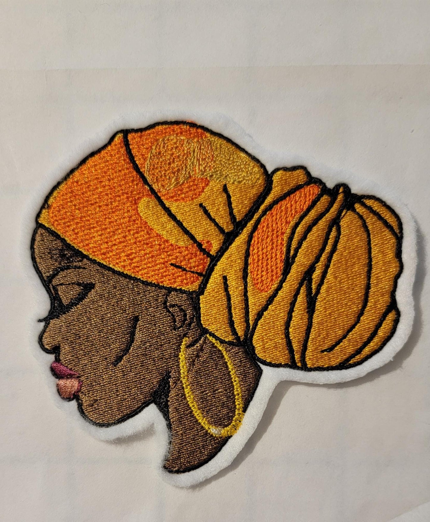 Regal Beauty in Gold Headwrap – Embroidered Patch